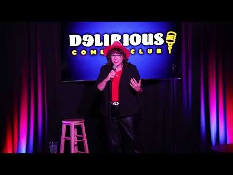 Denise Vasquez Performing Comedy At Delirious Comedy Club's Showcase