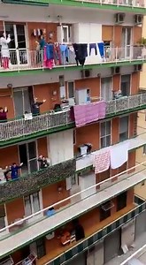 5.1M views · 65K reactions | Every evening at 6pm, Italians are making it a thing across the country where they'll go out on their balconies to sing, play instruments & try to lift each other's spirits while in quarantine ❤️ ️ TW/mmarrucco | Italian Football TV - IFTV | Facebook
