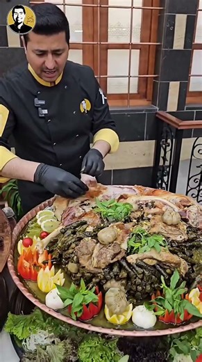 Chef Abu Omar - Stuffed grape leaves with lamb mansaf at the Damascus House buffet