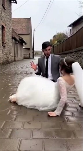 BRIDE FALLS! 😱 Groom Trips Carrying Her Over Threshold