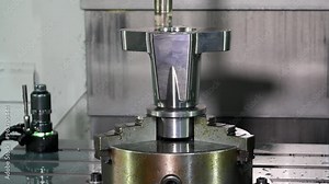CNC milling machine with attached a probe. High technology manufacturing process. Vertical CNC lathe adopts table movement to keep stable and high precision. Computer Numerical Control. Seamless loop