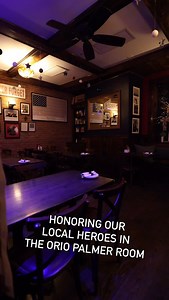 Gather in the Orio Palmer Room — a cozy, semi-private space tucked behind the Heritage Restaurant fireplace. Named in honor of local hero Orio Palmer, this intimate room celebrates the courage and dedication of the heroes in our community. Perfect for small gatherings with big meaning. | The Heritage Bar & Restaurant