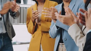 Download A group of people clapping together for free