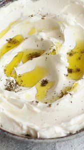 7.4K views · 65 reactions | Labneh is a luscious and creamy yogurt cheese originating from the Middle East. This simple recipe creates a tangy spread, perfect for drizzling with extra virgin olive oil and pairing with warm pita. Check the recipe here https://www.unicornsinthekitchen.com/easy-homemade-labneh-recipe-video/ | Unicorns in the Kitchen | Facebook