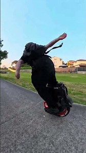 What is the man on one wheel electric unicycle doing???