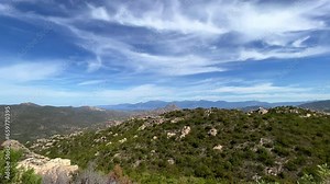 Panoramic panning view of Agriates Desert nature reserve in summer season, Corsica island in France