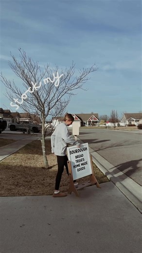 Running a tiny front porch stand means baking all night and stocking shelves before the kids wake up 🤎 Would you ever shop at something like this? #frontporchstand #smallbusinessjourney #sourdoughbaker #momownedbusiness #cottagebaker