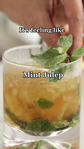 Here’s the full recipe: • 12 to 15 fresh mint leaves, plus one sprig for garnish • 1 ounce simple syrup (or peach-flavored syrup) • 2½ ounces bourbon • Superfine sugar (optional) Step 1 Place mint and ¼ ounce simple syrup in julep cup or 8- to 10-ounce old-fashioned glass and gently crush leaves with a wooden muddler, working them up sides of glass. Step 2 Loosely pack glass with finely crushed ice, then add bourbon. Drizzle remaining simple syrup on top and garnish with mint sprig lightly duste