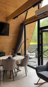 A-frame House. Modern new frame country house. The interior of the house of the recreation complex.