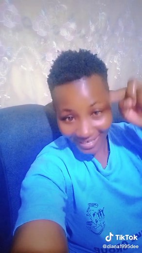 Woman in Graphic Fish T-Shirt Expresses Indoor Style