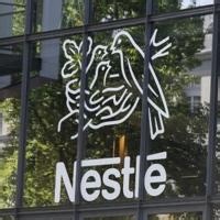 Nestle sales slump under strong franc but volumes recover