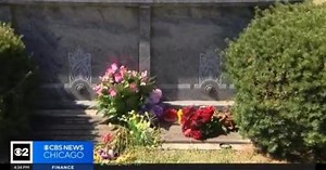 Flowers laid at the grave of Emmett Till 68 year after his brutalized body was found in a river