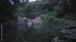 SLOW MOTION: looking over the water towards Mango Waterfall in Adjuntas, Puerto Rico Stock Video