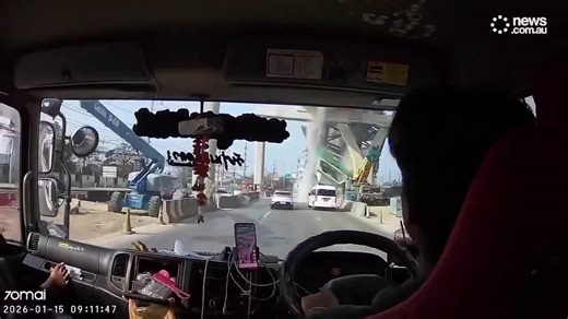 Dashcam captures horror moment crane collapses killing two