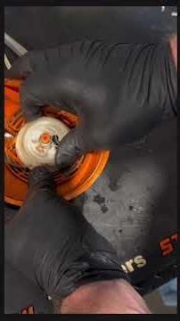 Recoil rewind starter stuck on Stihl HS 56 Hedge trimmer. Fix a rusty recoil spring and rope rotor.