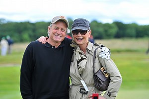 Michael Douglas’ Wife Catherine Zeta-Jones Makes Him “Whip It Out” On The Golf Course If He Doesn’t Drive His Ball Past The Women’s Tee Box