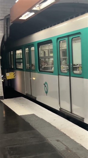 Paris Metro train entering Pigalle