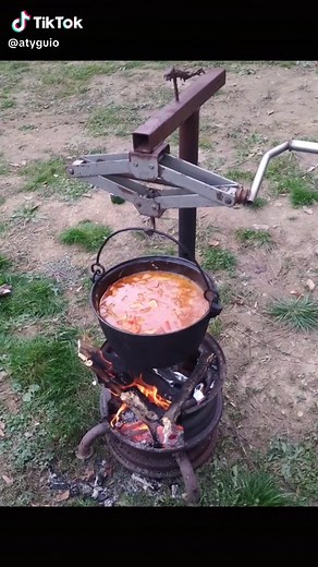 Outdoor Cooking: Boiling Stew in a Cauldron