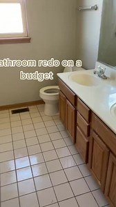 Bathroom redo on a budget. We kept the existing tile and vanity and changed out faucets, painted walls, cabinets and upgraded the shower head. New overhead lighting and fresh accessories! Linking everything used in my bio #bathroomrefresh #LTKhome #fliporflop #designonabudget #bathroomdesign #homevalue #howto | Amanda Albrecht