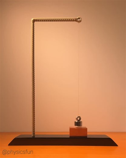 physicsfun on Instagram: "Magnetic Breaking Pendulum: The moving magnetic field from the swinging magnet produces electric currents in the copper- these currents then produce magnetic fields that oppose the motion of the moving field, a specific application of Faraday’s law of induction called Lenz’s Law. So a moving magnet makes the copper slab briefly into an electromagnet that creates a field that opposes the pendulum’s motion. Note that if the copper slab is pulled away from the hanging magn