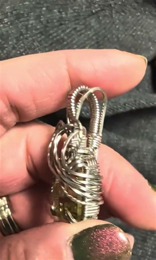 Prong set wire wrapped faceted gemstone. Let me know in the comments if you would like a tutorial.