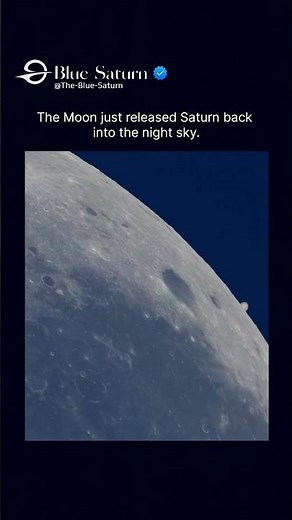 This is the exact moment Saturn rises from behind the Moon.