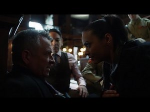 185. Gotham (s4e19). Alfred and Tabitha distract embassy guards.