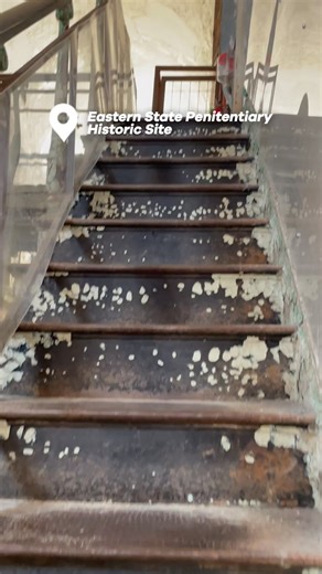 Explore the incredible architecture of Eastern State Penitentiary during your next stop in Philly. 📍 Step up to the gallery of the historic Cellblock 7 and take in this truly remarkable view! | Eastern State Penitentiary