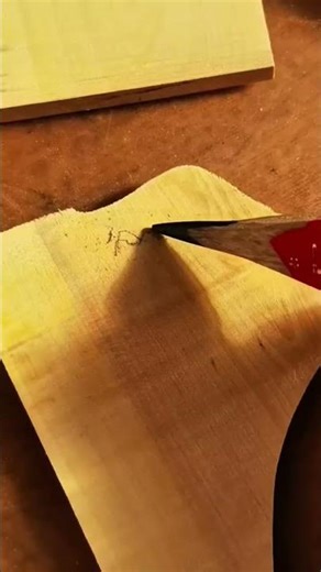 Someone Is Cutting Wood Plank Using Scroll Saw