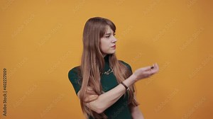 Human pulling hands to reach out each other. Almost reaching fingers outdoors. Individual interaction. Future concept. Studio shot. Hand stretch out for help. Young attractive woman, dressed green