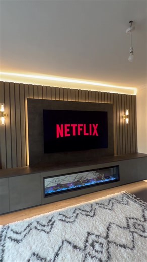 Installing a Modern Wall Light Fixture in a Living Room