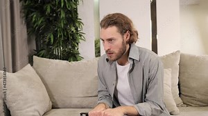 Stressed business man feels frustrated by data loss using laptop at work. Shocked male user looks at computer reads bad news close screen, has unexpected online website problem sitting at home.