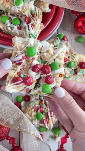 Julie Smithson | Easy Cookie & Dessert Recipes on Instagram: "Walking through a snowy Christmas town with hot chocolate and twinkle lights all around 🎄😍 This cake mix cookie bar recipe is SO EASY to make! Don’t skip the holiday M&Ms and Christmas Sprinkles! Add the drizzle on top for a little extra too! ✨ Comment JOY and I’ll send you the link to this FREE RECIPE & my favorite Christmas Recipes! ✨follow @lemon_peony for more melty & gooey cookie recipes & CHRISTMAS Recipes you can’t resist! 🍪