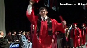 Graduate's backflip completely flops