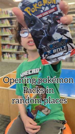 Zack on Instagram: "Opening a black bolt pokemon pack at the library! Opening pokemon packs in random places! #pokemon #pokemoncommunity #relax #cards #tcg"