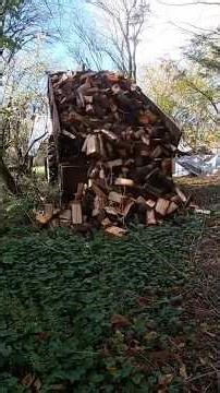 Using the tractor to tip logs