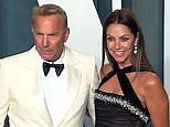 Kevin Costner and his wife arrive at 2022 Vanity Fair party
