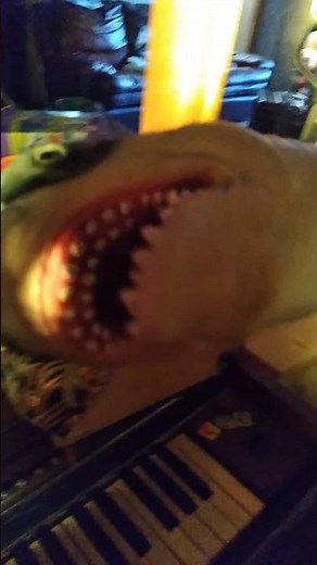 shark puppet eats alien food
