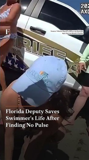 Florida Deputies Revive Unresponsive Swimmer After Dramatic Beach Rescue | Firstpost News