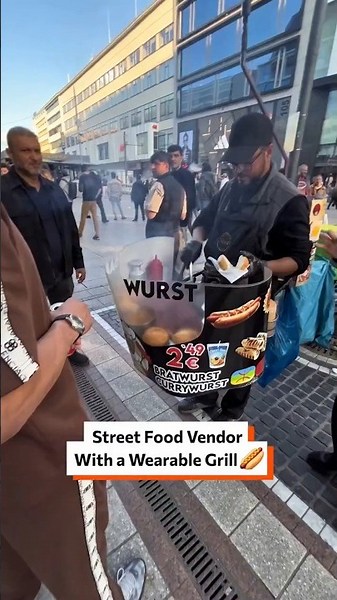 Street food vendor with a wearable grill 🌭🤩 #StreetFood #Foodie #Sausage