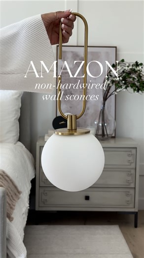 Jen Adams | @interiordesignerella on Instagram: "Comment “CHIC” to shop! 16% off Amazon wall sconces!!!🤩 They require no hardwiring and are battery operated using rechargeable bulbs!! 💡🤍 With the included remote control, you can adjust the brightness and change the color!! Happy to link the sconces (they come in a set of 2)!! 💕🩷 Check your DM and if you don’t see links, it might be in your message requests! You must be following the account for the DM to go through!😍 I appreciate you so mu