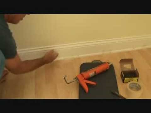 Installing baseboard trim to a concrete wall