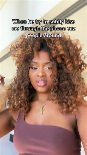 Playful Lip Puckering Moment on Video Call