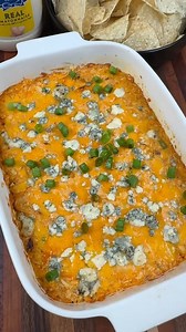 @Hellmann’s Mayonnaise Disappearing Buffalo Chicken Dip is an easy and delicious appetizer perfect for tailgating or all of the fall get-togethers! #HellmannsPartner Pick up all of the ingredients to make this recipe at your local Kroger! INGREDIENTS 2 cups finely chopped or shredded cooked chicken 1/3 cup hot pepper sauce 1 cup shredded cheddar cheese 1 cup shredded mozzarella cheese 3 green onions, chopped 1 tsp. lemon juice 1 cup Hellmann’s Real Mayonnaise 1/4 cup crumbled blue cheese INSTRUC