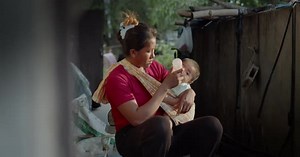 A Thai woman which is a single mother working as a farm laborer in rural Southeast Asia
