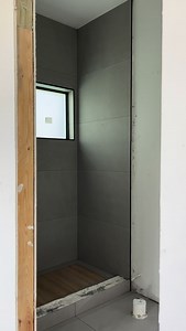 A sneak peek at this guest bath upgrade—matte slate large formats, wood-look floors, and all the natural light you could want. The vision is coming together. 👀🔨 #blackstonehomeservices #designbuild #kitchenandbath #dreamhome #remodeling #kitchenandbathdesign #homerenovation #bathroomrenovation #bathroom #bathroominspo #bathroomtiles #slatetiles #jupiter #jupiterflorida #jupiterfl | Blackstone Home Services