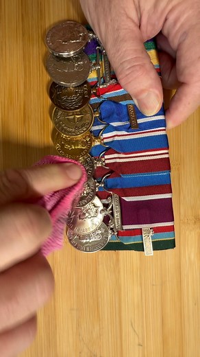 Cleaning your medals, with ribbons attached, ensuring no stains on the ribbon. #medalcleaning #medals | Specialised Medal Services
