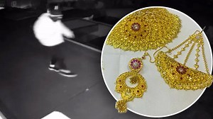 Watch: Masked thieves caught on camera stealing £500k of gold jewellery from London home as owners sat inside | LBC