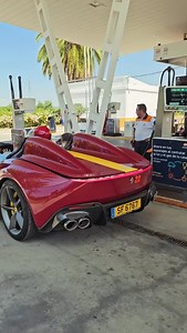 When you leave the gas station in style with your Ferrari SP2 #sp2 #ferrari #hypercar #carspotting | Marbella Luxury Garage