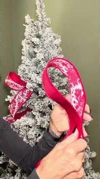 Easiest way to put ribbon in your tree #christmastree #christmasdecor #ribbon ￼